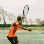 Olahraga Raket Tenis Dengan Net Di Tengah