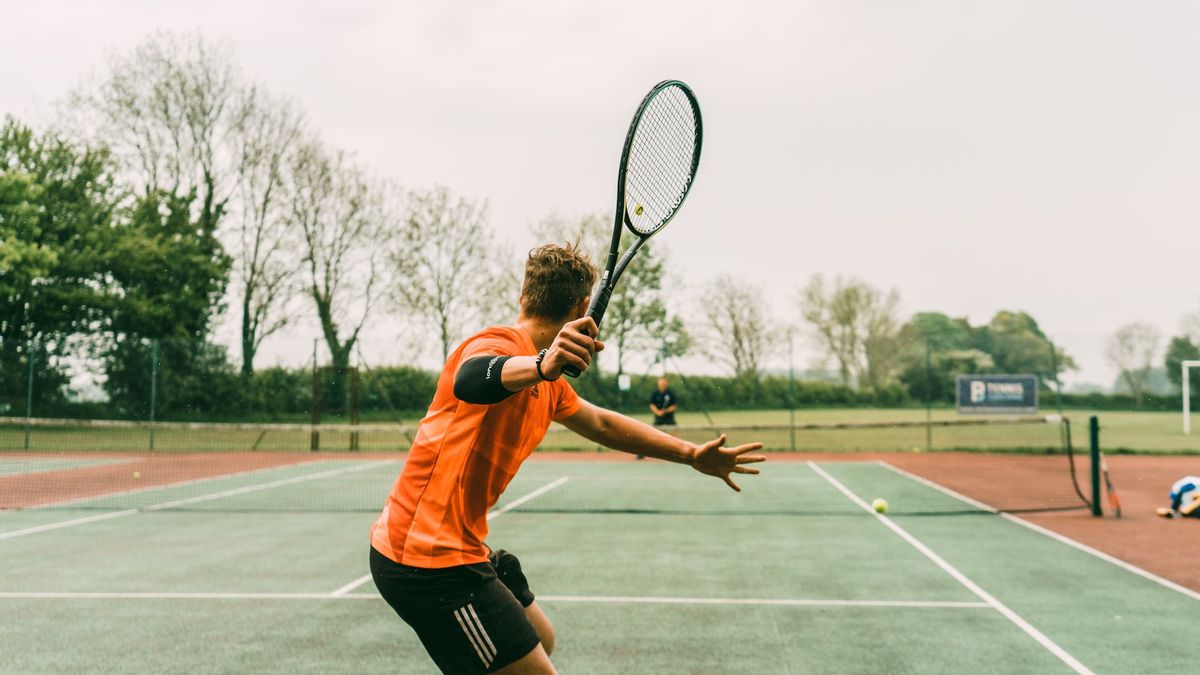 Olahraga Raket Tenis Dengan Net Di Tengah